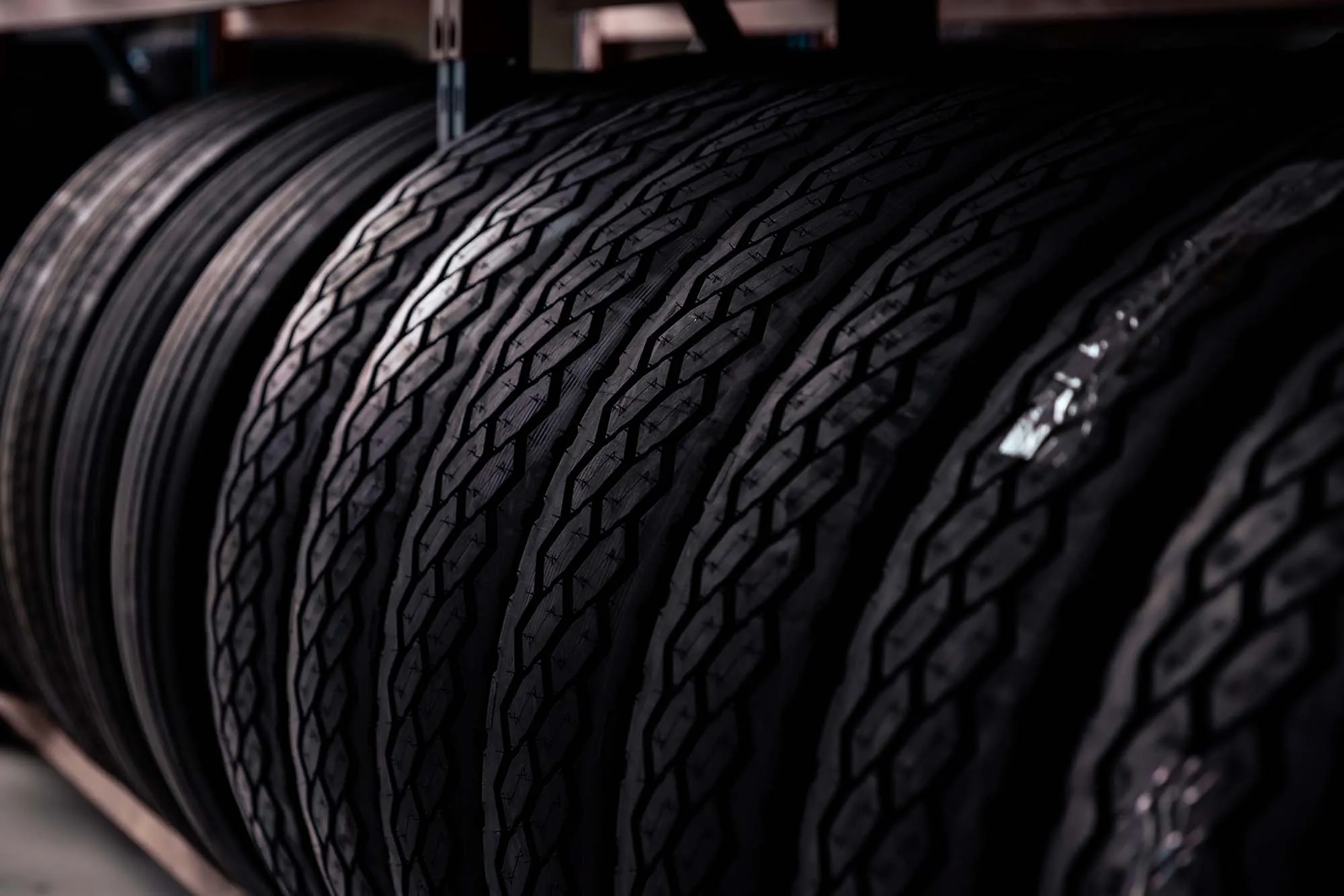 A rack of stacked tyres in the workshop